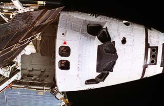 View of shuttle nose from Mir window 